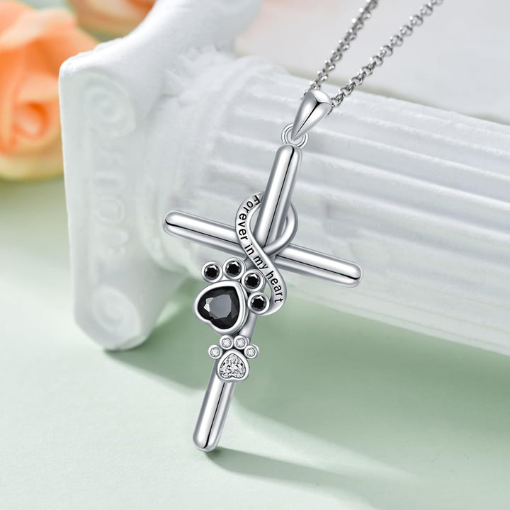 Silver Pendant with Footprints and a Cross