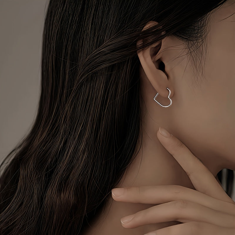 Heart-shaped stainless steel earrings in gold colour
