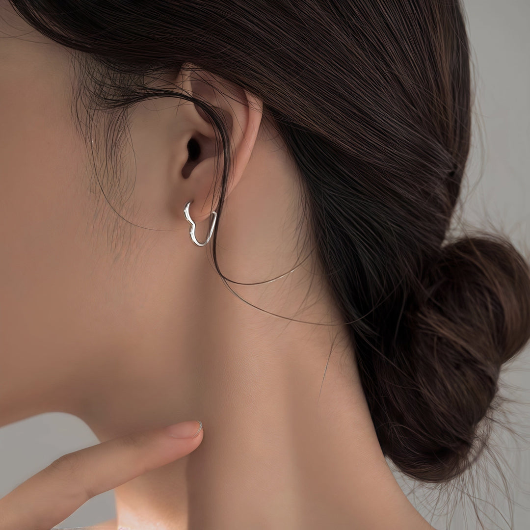 Heart-shaped stainless steel earrings in gold colour