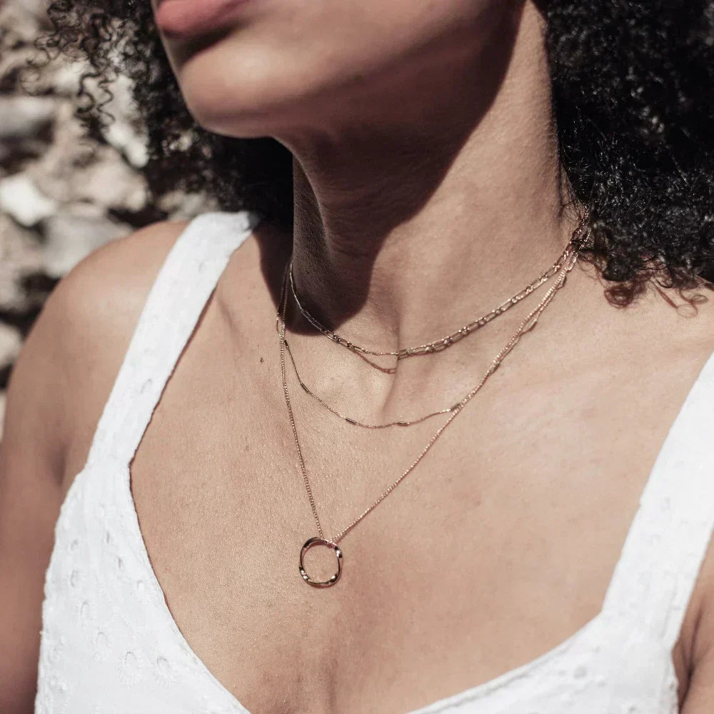 Open Circular Necklace with Three Rows of Gold