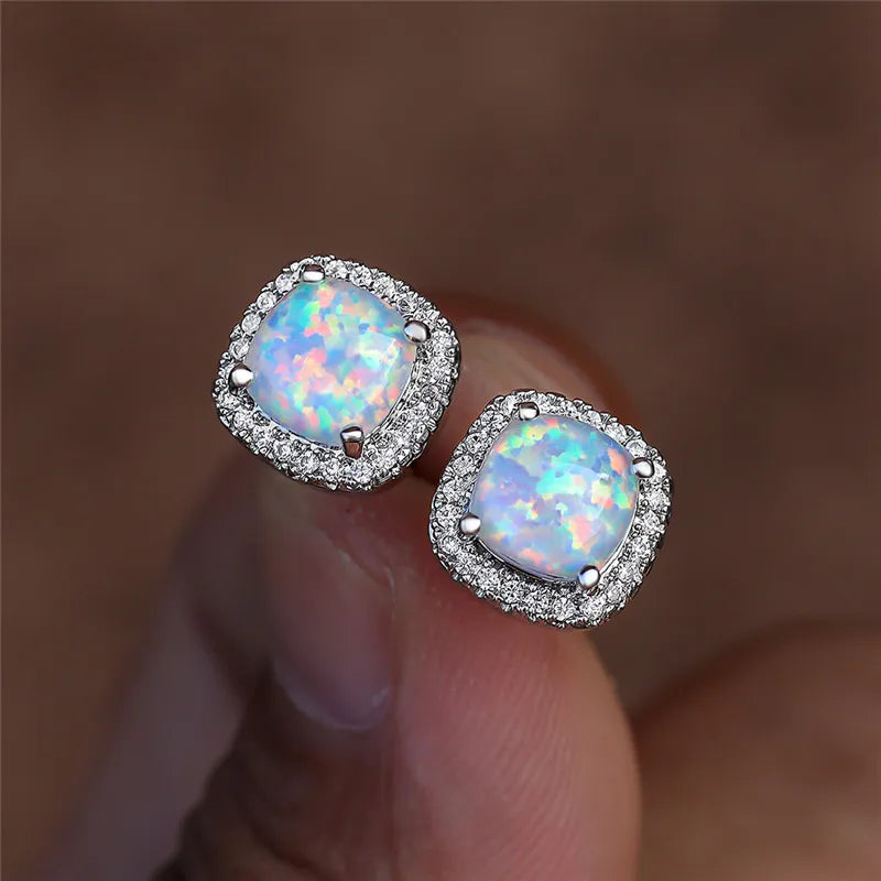 Elegant silver earrings with round white vuuropals