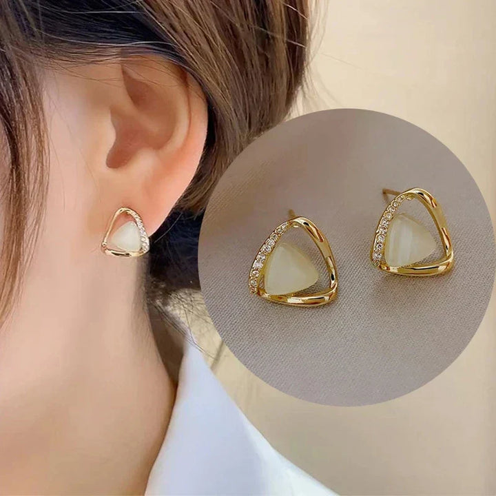 Elegant triangular earrings with opal and crystals