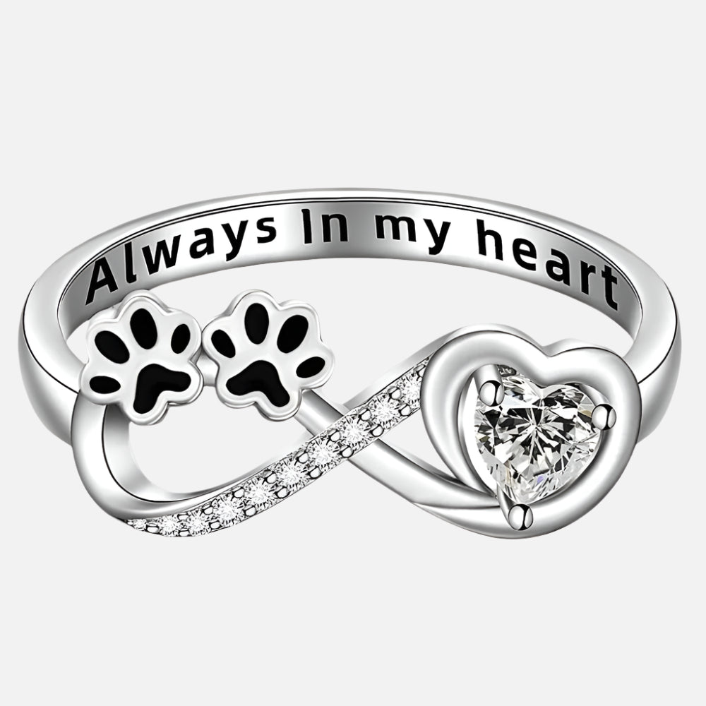 Ring with an open heart and an infinity symbol.